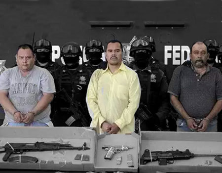 Tijuana members stand surrounded by Mexican armed forces
