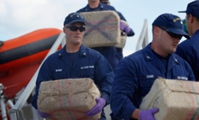 Coast Guard officials in Florida unload seized cocaine in March 2012