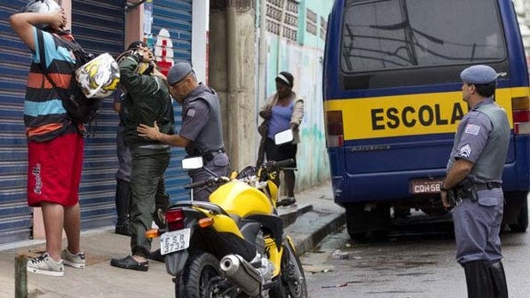 Police search residents in Paraisopolis favela, Sao Paulo