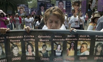 A woman protesting disappearances in Mexico City, 2012