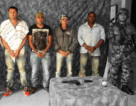 Four members of the AGC, or Gaitanistas, after their arrest in Colombia