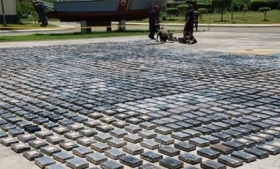 Authorities display a large cocaine seizure