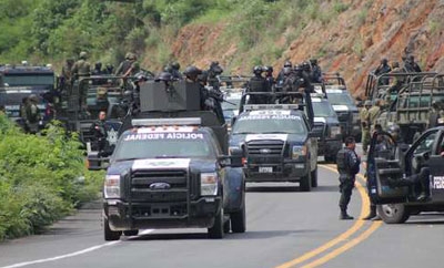 Police, soldiers sent to remove roadblocks in Michoacan