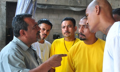 Truce mediator Raul Mijango with gang members