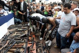 El Salvador gang members hand in weapons as part of the truce.