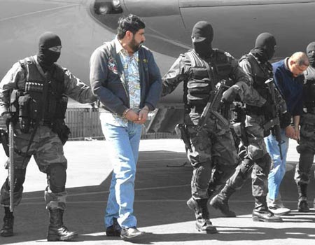 Alfredo Beltrán Leyva is moved by security forces following his arrest