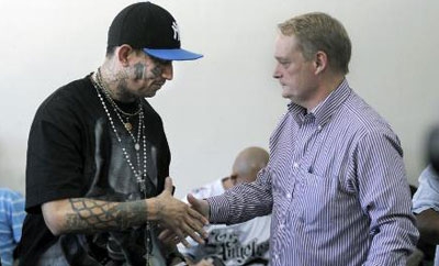 OAS representative Adam Blackwell meets a gang member