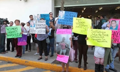 Family members of Heaven victims protest lack of official support.
