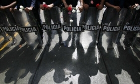 A third of survey respondents called for police reform in Venezuela