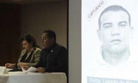 Guatemalaâs attorney general (far left) announces arrests