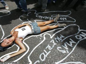 A student protests rising murders in Caracas