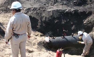 An illegal fuel siphon on a Pemex pipeline