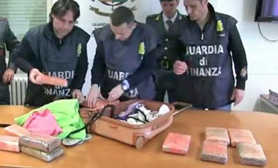 Police in Italy with the recovered drugs