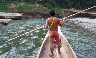 A Wounaan man navigates through indigenous territory