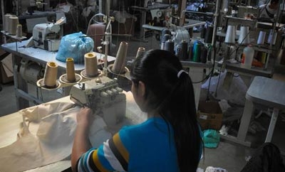 A Bolivian worker in a Sao Paulo textile workshop