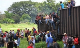 Migrants on "The Beast" in Mexico