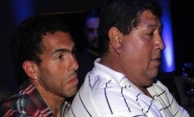 Carlos Tevez with his father