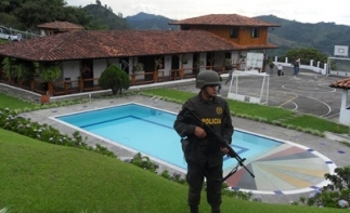 Colombian police during a property seizure