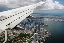 A plane approaching the Miami coastline