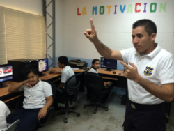 El Salvador policeman at a violence prevention class