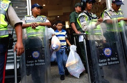 Police outside a Venezuelan supermarket
