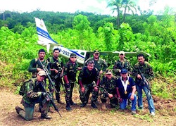 Peruvian security forces with the shot down plane