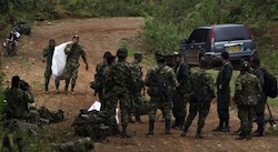 Soldiers with a body bag in Cauca, Colombia