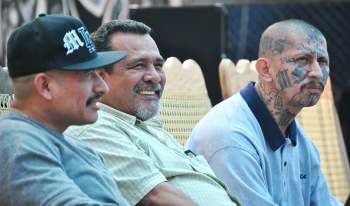 Raul Mijango with 2 gang leaders