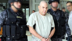Gastelum Serrano being transported by Mexican authorities