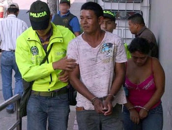 Colombian police arresting low-level drug suspects