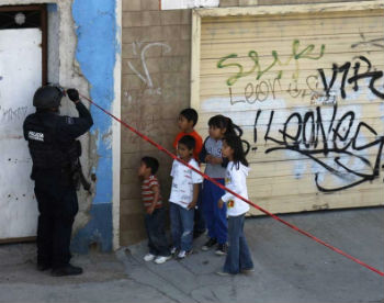Children at a crime scene in Mexico