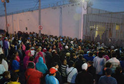 Onlookers outside Topo Chico prison