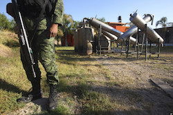 A Mexican soldier at a seized meth laboratory