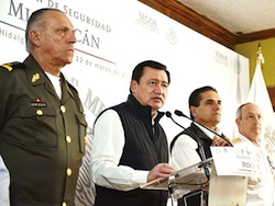 Interior Minister Miguel Ãngel Osorio Chong (second from left)