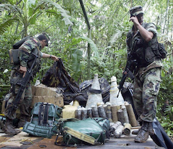 Ecuadoran security forces inspect a suspected FARC encampment