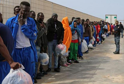 African migrants waiting in Tijuana to cross the border into the US