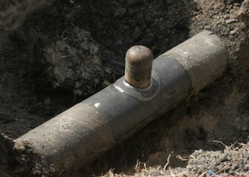 A clandestine tap used to siphon oil from a pipeline