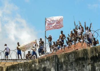 Inmates on the roof of State Penitentiary of Alcacuz during a riot on January 16.