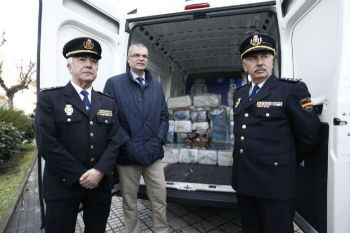 Spanish authorities with seized cocaine