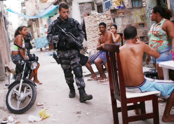 A policeman patrolling a favela in Rio de Janeiro