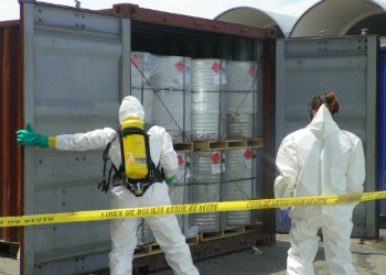 Salvadoran authorities inspecting a container