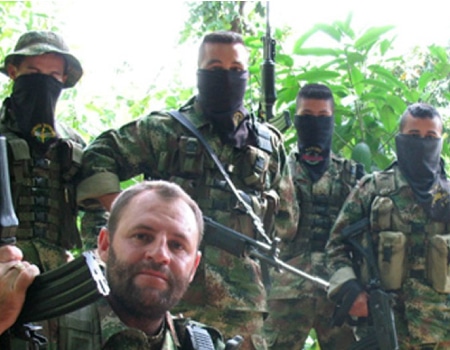 Members of the EPL group in Colombia, several with face masks