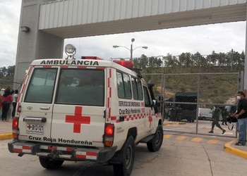 An ambulance enters La Tolva Prison in Honduras