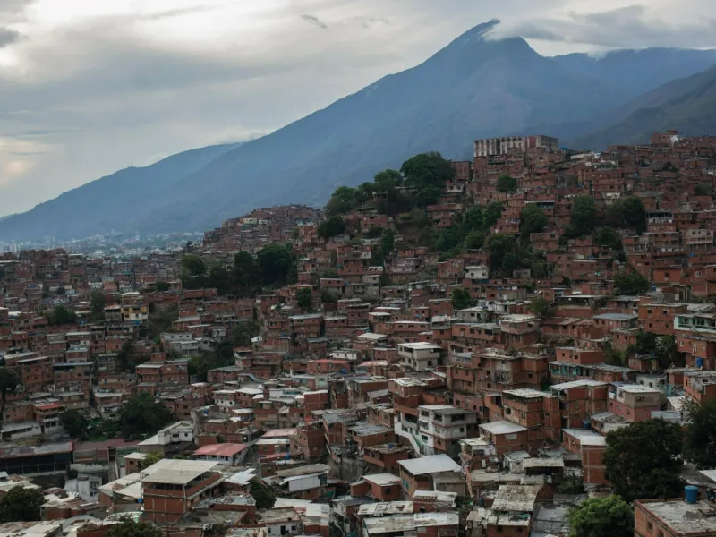 Cinderblock homes fill the hills of the Petare slum in Caracas, Venezuela,