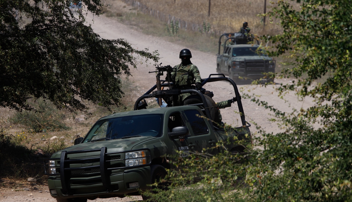 Mexico-Mexican-soldiers-patrol-near-Naranjo-de-Chila-in-the-municipality-of-Aguililla-Feb-2022-AP_22050115239497-A2.jpg