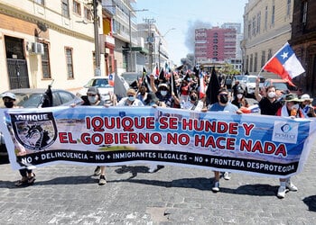 Protestors march against crime and violence in Iquique, Chile