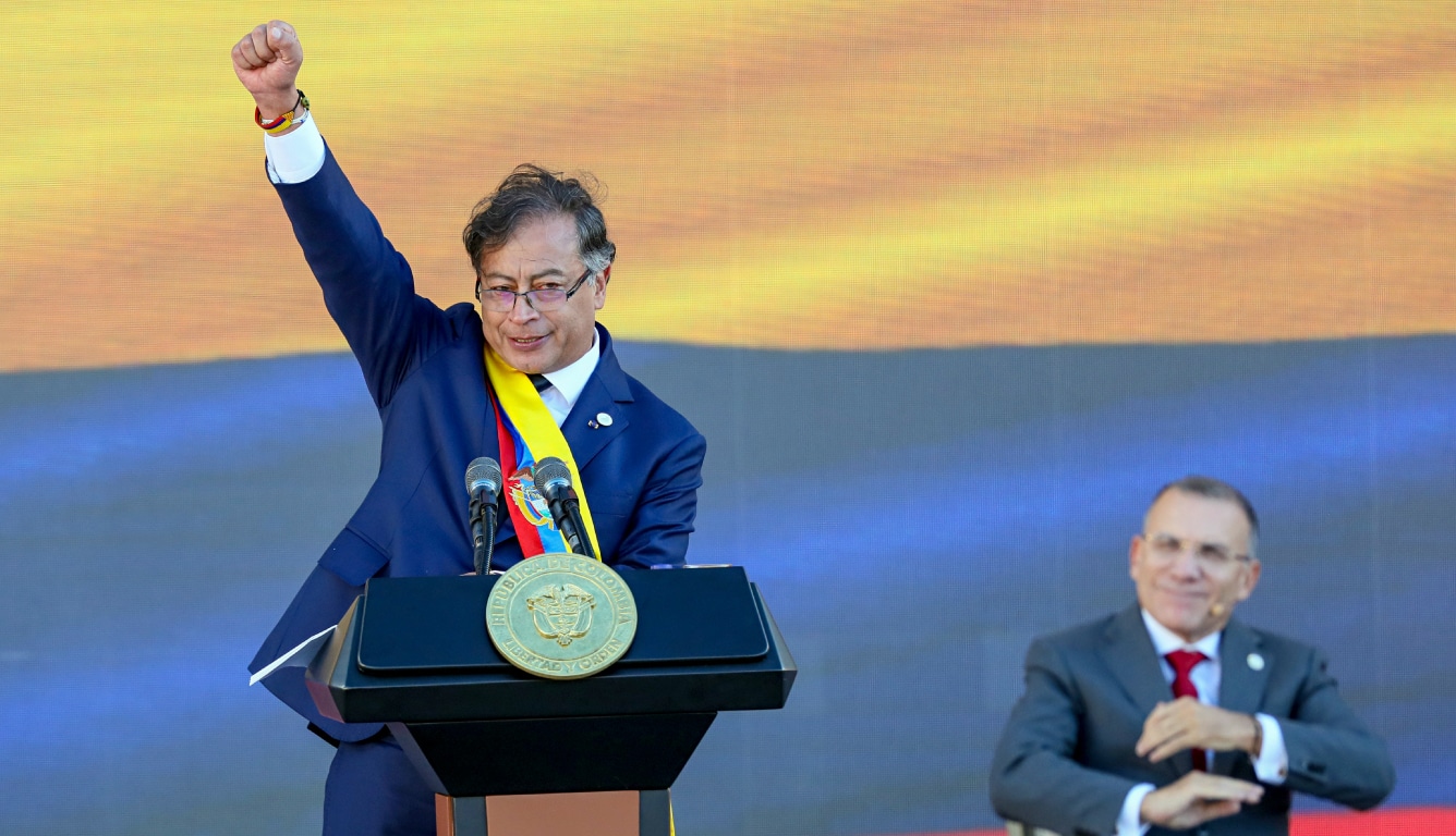 President Gustavo Petro of Colombia raises a fist in celebration