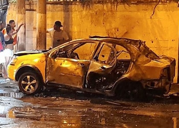 A burnt out car in Guayaquil following 24 hours of gang violence in November.