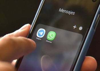 Messenger services Telegram and WhatsApp are seen on a mobile phhone