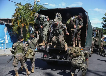 Soldiers arrive in the city of Sopayango in El Salvador as part of a crackdown on gangs.